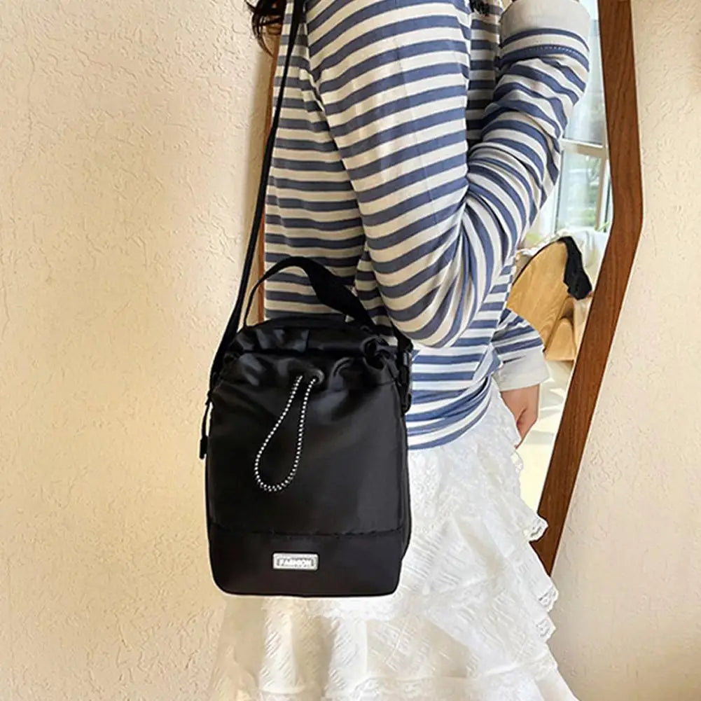 Compact Waterproof Sling Bag with Water Bottle Pocket – Urban Travel Crossbody