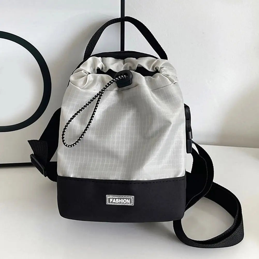 Compact Waterproof Sling Bag with Water Bottle Pocket – Urban Travel Crossbody